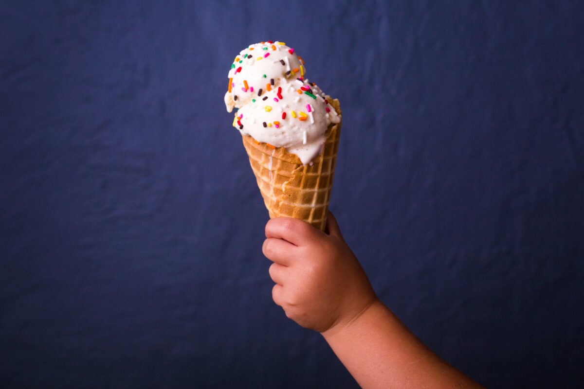 hand holding an ice cream cone